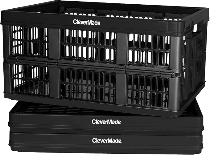 CleverMade Collapsible Utility Crates, 45L, 3 Pack, Obsidian | Interlocking crates stack open or folded and carry 66 lb each. Side handles make groceries, tools, and gear easier to move.