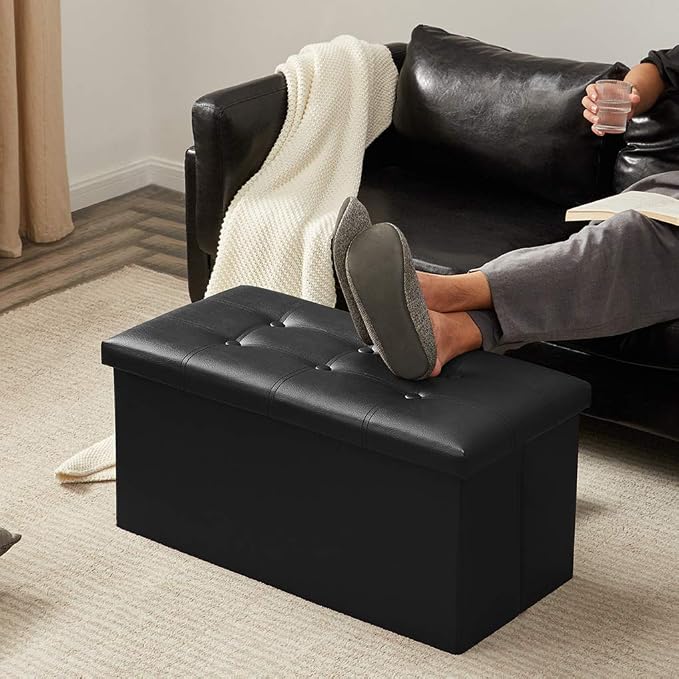 YOUDENOVA 30" Ottoman with Storage, Folding Faux Leather Bench, Black | Foldable ottoman with hidden storage, padded faux leather seat for living room, bedroom and entryway.