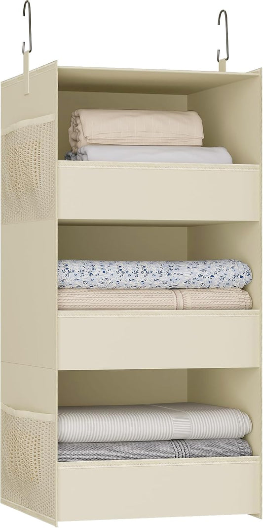 3-Shelf Hanging Closet Organizer, Washable Foldable Storage Shelves, Beige | Front lip keeps items secure; side pockets add room; Oxford fabric handles towels, shirts, baby items, dorms, RVs or travel.
