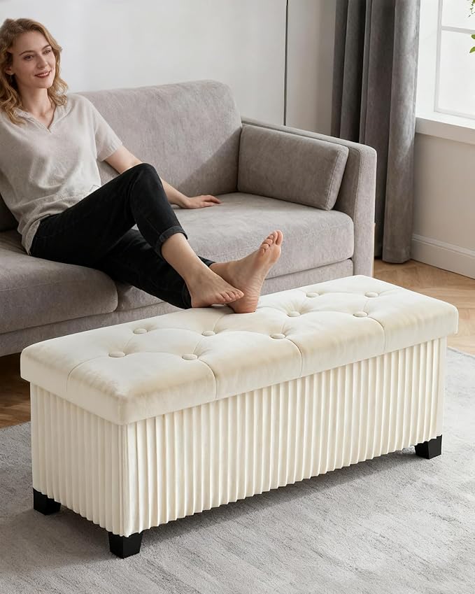 LITZFUR 43 Inches Storage Ottoman Bench, Velvet Foot Rest Stool, Beige | Folding Ottoman with Legs, End of Bed Bench, Storage Chest for Living Room, Bedroom