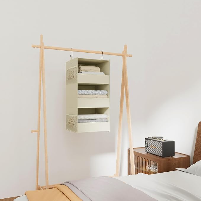 3-Shelf Hanging Closet Organizer, Washable Foldable Storage Shelves, Beige | Front lip keeps items secure; side pockets add room; Oxford fabric handles towels, shirts, baby items, dorms, RVs or travel.