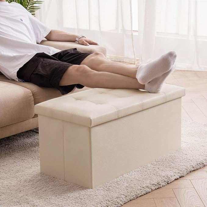 YOUDENOVA 30" Ottoman with Storage, Folding Faux Leather Bench, Beige | Foldable ottoman with hidden storage, padded faux leather seat for living room, bedroom and entryway.