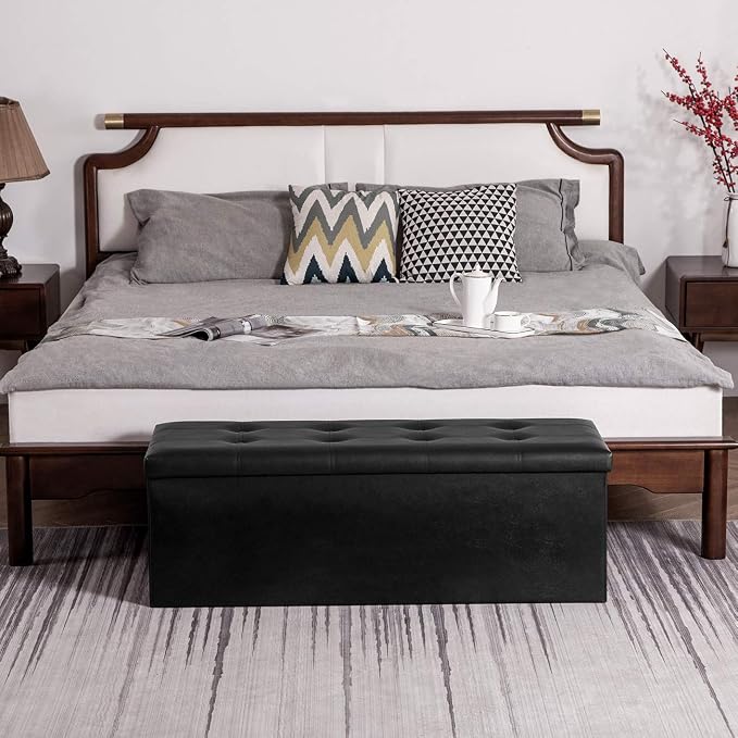 YOUDENOVA 43" Ottoman with Storage, Folding Faux Leather Bench, Black | Foldable ottoman with hidden storage, padded faux leather seat and sturdy MDF frame for everyday use.