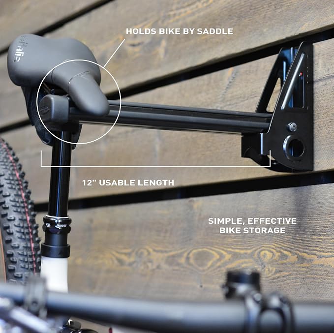 Feedback Sports Velo Wall Post Bike Storage Mount + Bike Wheel Storage | Fold-away post saves wall space while holding bikes or wheels; rubber-coated arms protect frame finishes