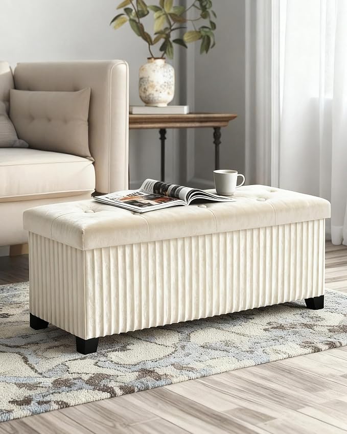 LITZFUR 43 Inches Storage Ottoman Bench, Velvet Foot Rest Stool, Beige | Folding Ottoman with Legs, End of Bed Bench, Storage Chest for Living Room, Bedroom