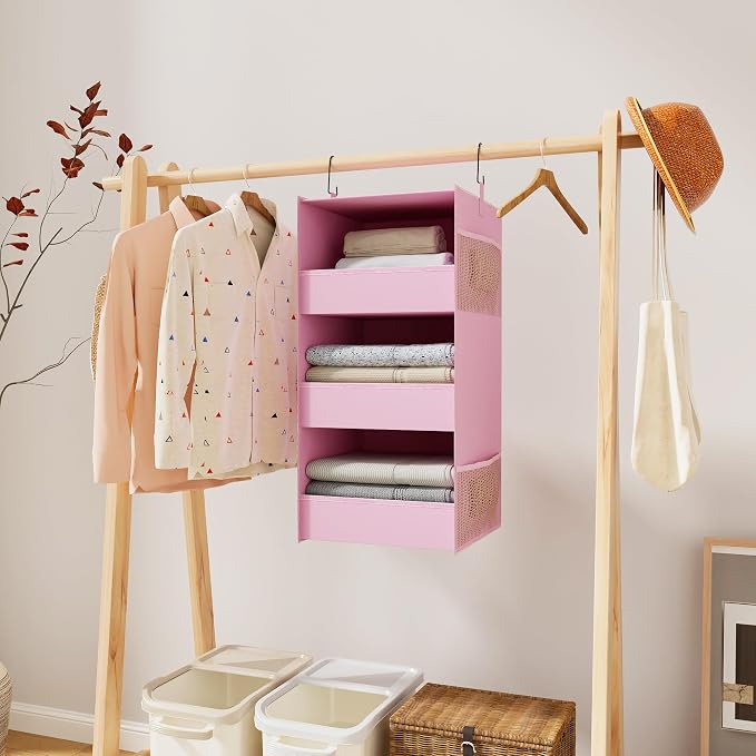 3-Shelf Hanging Closet Organizer, Washable Foldable Storage Shelves, Pink | Front lip keeps items secure; side pockets add room; Oxford fabric handles towels, shirts, baby items, dorms, RVs or travel.