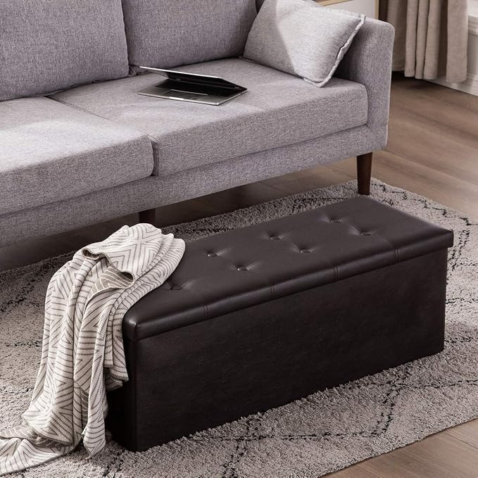 YOUDENOVA 43" Ottoman with Storage, Folding Faux Leather Bench, Brown | Foldable ottoman with hidden storage, padded faux leather seat and sturdy MDF frame for everyday use.