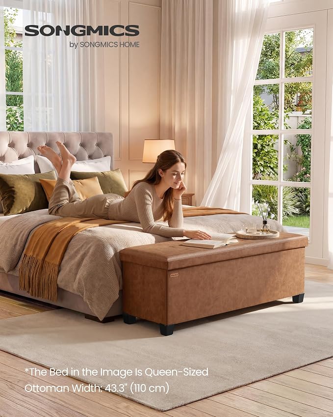 SONGMICS Storage Ottoman Bench with Legs, Folding Ottoman Foot Rest with Flipping Lid, Bench with Storage, for Living Room, Bedroom, Entryway, Synthetic Leather, 43.3 Inches, Coffee Brown ULSF085KQ01