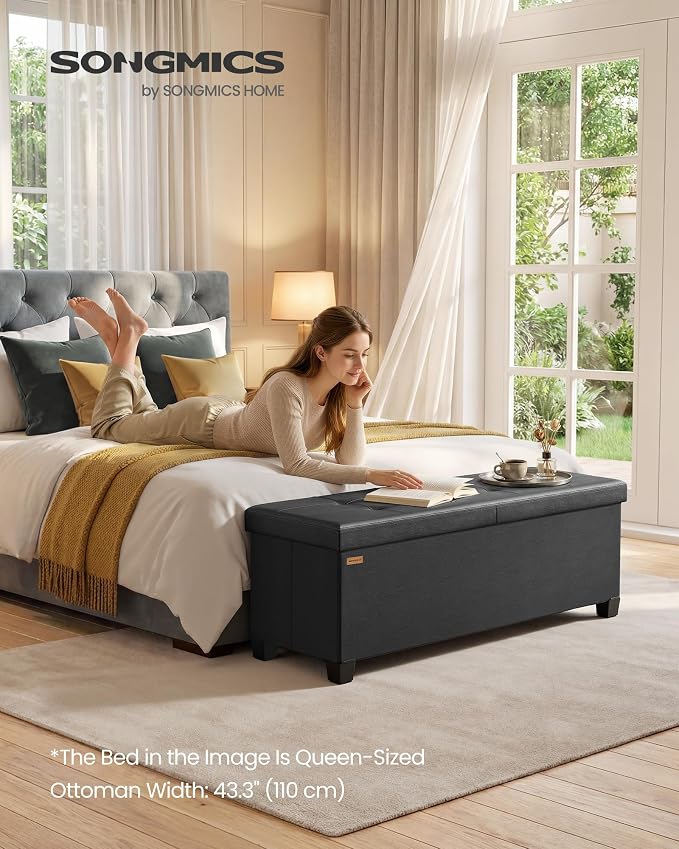 SONGMICS Storage Ottoman Bench with Legs, Folding Ottoman Foot Rest with Flipping Lid, Bench with Storage, for Living Room, Bedroom, Entryway, Linen-Look Fabric, 43.3 Inches, Ink Black ULSF079BH01