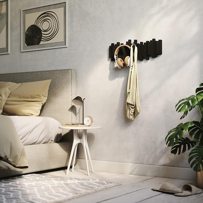 Umbra Sticks Wall Mount Coat Rack, 5 Hook Retractable Pegs, Black | Mounting hardware included, sculptural modern design, entryway or bedroom use, recycled plastic