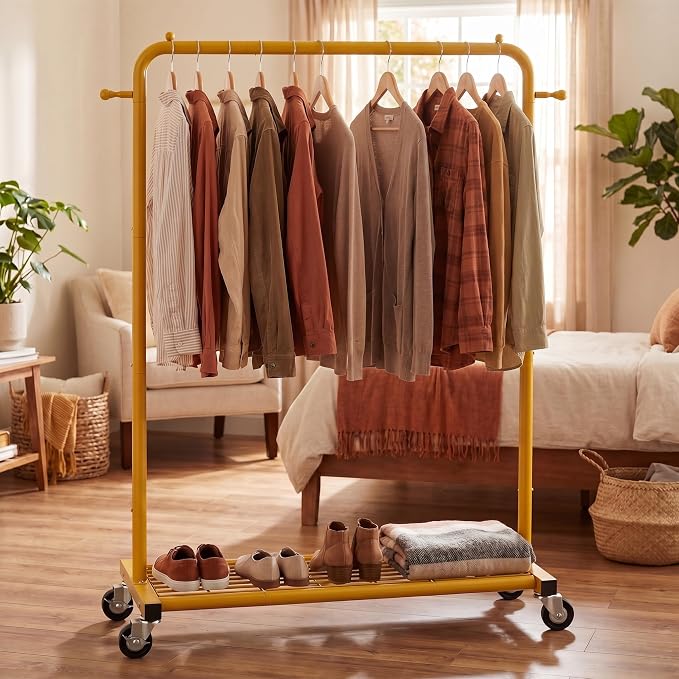 Sywhitta Metal Garment Clothing Rack on Wheels with Mesh Shelf,Gold Yellow | Rolling Garment Rack for Hanging Clothes, Coats, Skirts, 39.76" L x 16" W x 63.78" H,Space-Saving Mobile Organizer for Closet